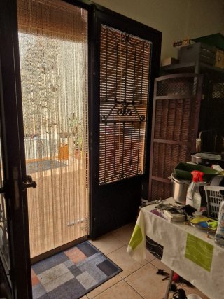Puerta de hierro forjado