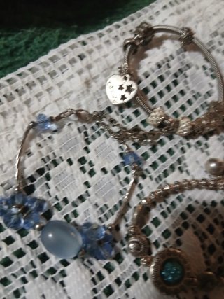 Tris braccialetti Sterling e acciaio con charme