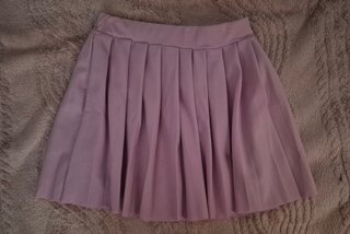 Falda corta plisada rosa