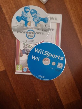 Mandos Wii + Nunchuk+5 juegos  Precio negociable