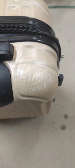 Maleta de viaje rígida beige
