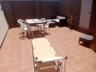 Tumbona plegable beige y plateada