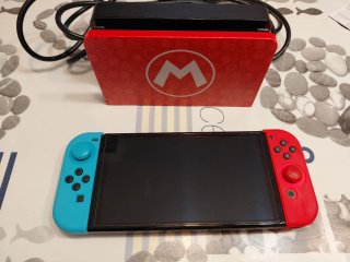Nintendo Switch OLED + Mando Pro