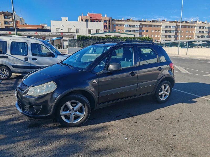 Suzuki SX4 2009 - foto 1
