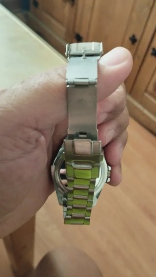 Reloj de marca de lujo verde