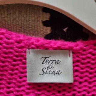 Chaqueta Terra di Siena de color rosa.