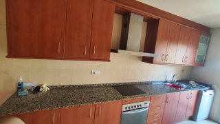 Mueble de cocina madera y piedra