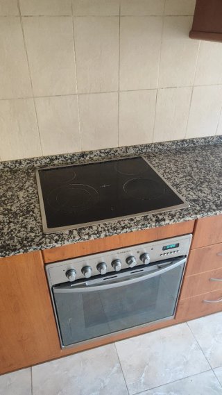 Mueble de cocina madera y piedra
