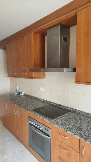 Mueble de cocina madera y piedra