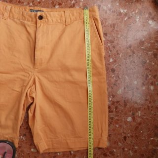 Pantalón corto naranja hombre