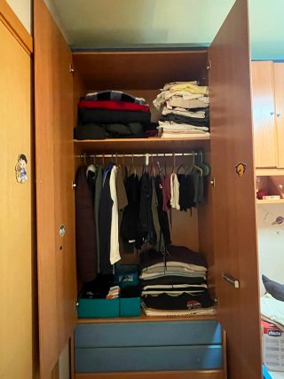 Cama individual con cajones de madera