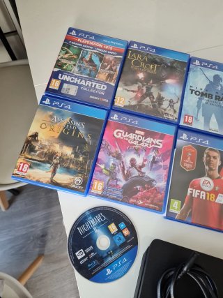 PS4 Slim 500GB + Mando + 8 Juegos