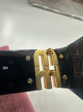 Gafas de sol Miu Miu Negras y Doradas Mujer