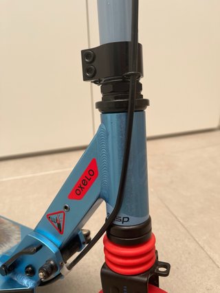 Patinete infantil Decathlon azul y rojo