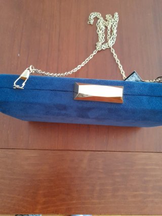 Bolso de fiesta azul y dorado