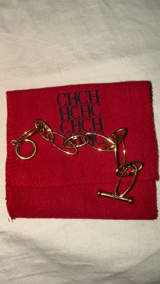 Pulsera Carolina Herrera Chapada en Oro