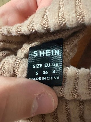 Jersey marrón cuello alto