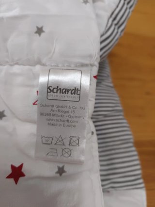 Paracolpi e lenzuola con stelle