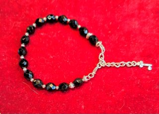 Pulsera depiedra natural, cuentas negras y plata