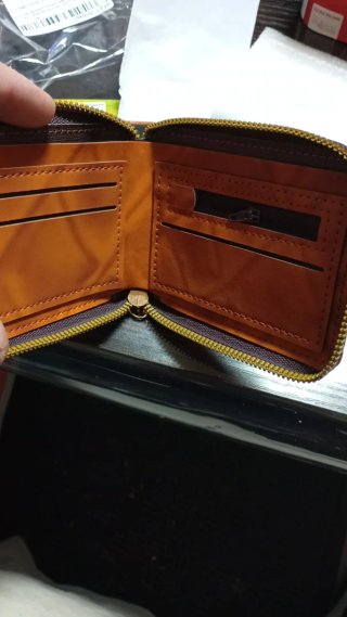 Cartera diseño en relieve dólar cuero sintet.NUEVO