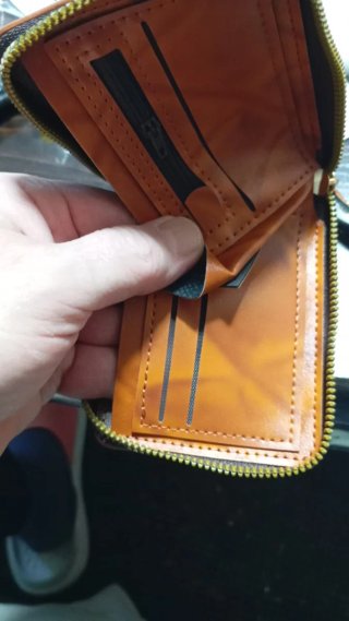 Cartera diseño en relieve dólar cuero sintet.NUEVO
