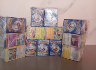 Lotto 500 carte Pokemon con 15 holo e reverse