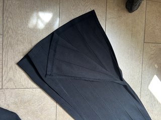 Pantalones acampanados negros con abertura
