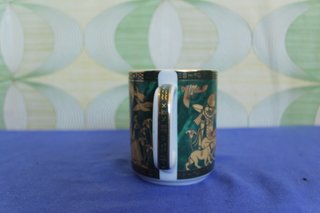 Taza de cerámica con diseño egipcio 1942
