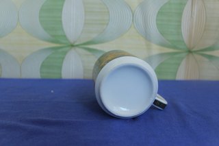 Taza de cerámica con diseño egipcio 1942