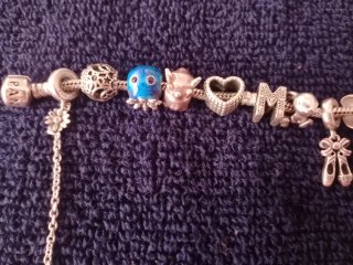 Pulsera Pandora  de plata  con 14 Charms