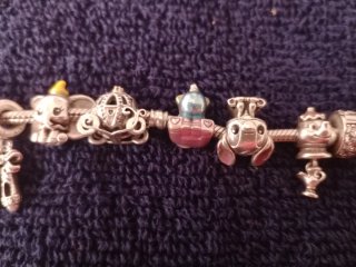 Pulsera Pandora  de plata  con 14 Charms