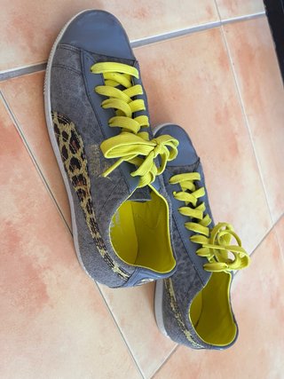 Zapatos Puma leopardo gris y amarillo