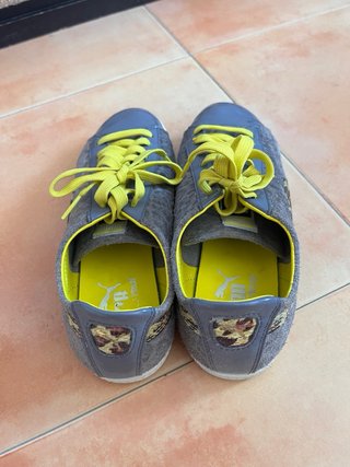 Zapatos Puma leopardo gris y amarillo