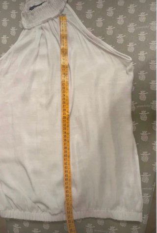 Top smanicato bianco