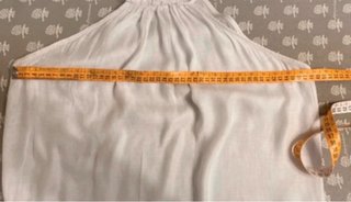 Top smanicato bianco