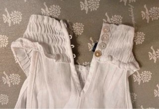 Top smanicato bianco
