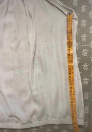 Top smanicato bianco