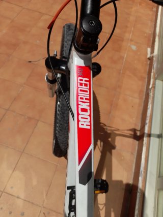 VENDO URGENTE bicicleta rockrider blanca y roja