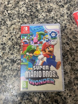 Nintendo Switch Lite Amarillo + 4 juegos
