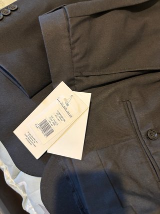 Traje completo negro sin estrenar con etiquetas
