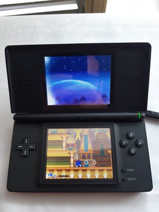 Nintendo DS Lite + accessori + altro (LEGGI)