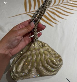 Bolso de fiesta dorado con pedrería