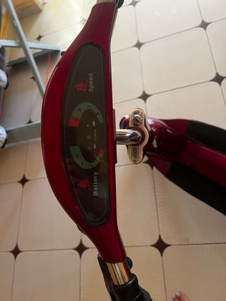 Patinete eléctrico con cargador,batería gastada