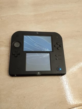 Console Nintendo 2DS nera e blu, ideale per pezzi o riparazione schermi