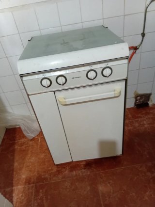 Cocina de gas 4 fuegos con horno