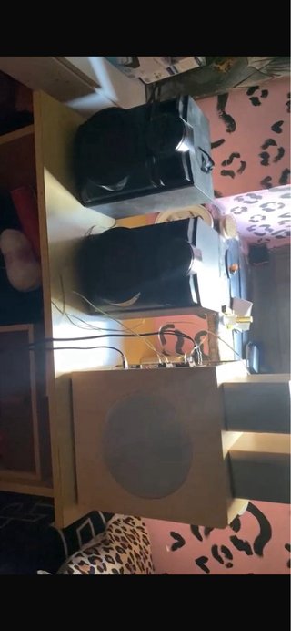 Subwoofer de madera y plata