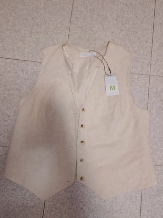 Chaleco beige talla M