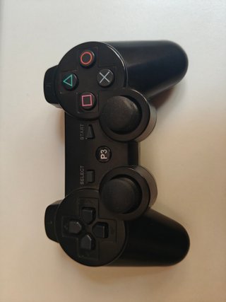 PlayStation 3 con 4 mandos y 5 juegos