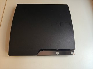 PlayStation 3 con 4 mandos y 5 juegos