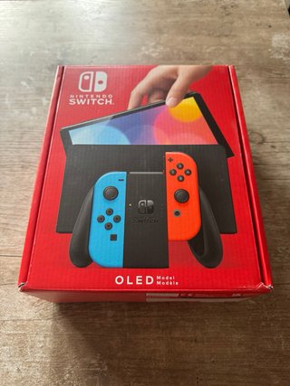 Nintendo Switch OLED + Mando Extra